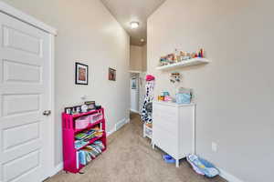 Interior space featuring light carpet