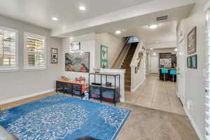 Playroom featuring tile patterned flooring