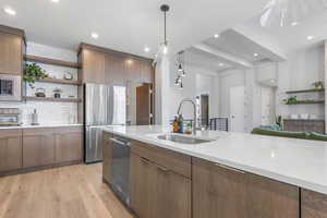 Kitchen Features Oversized Refrigerator & Floating Shelves