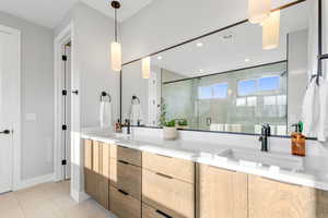 Primary Bathroom with Double Sinks & Black Accents