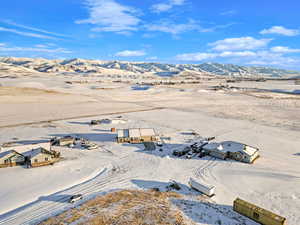 Snowy aerial view with a mountain view