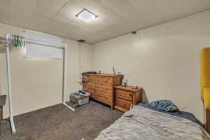 Bedroom with wood walls