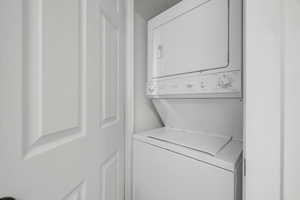 Washroom with stacked washer and dryer