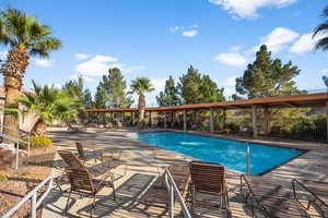 View of outdoor pool with a patio area