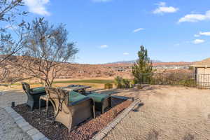 View of patio / terrace with a mountain view