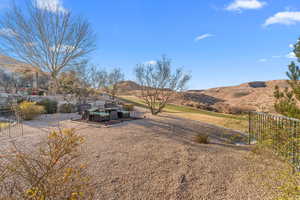 View of yard with a mountain view