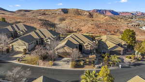 Birds eye view of property with a mountain view