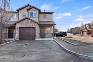 View of front of home featuring a garage