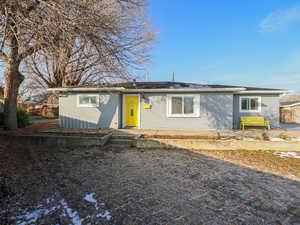 Single story home with a patio area