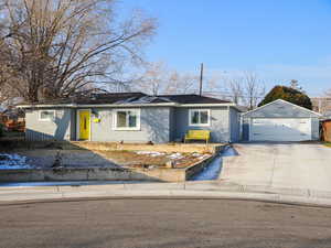 Ranch-style home with a garage