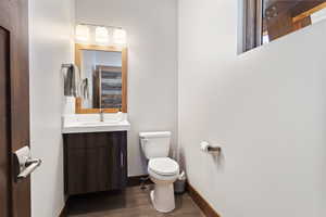 Bathroom featuring toilet and vanity