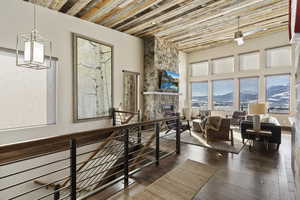 Interior space featuring a fireplace and dark hardwood / wood-style floors