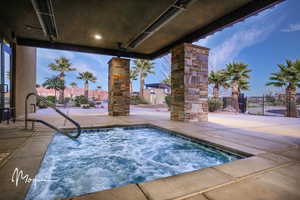 Year round, you can enjoy the covered hot tub, adjacent to the indoor pool. Heating elements overhead also help to keep you warm in the winter months.