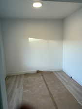 Unfurnished room featuring light hardwood / wood-style floors