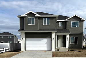 View of front of house with a garage