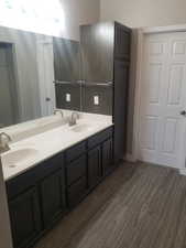 Bathroom featuring double vanity