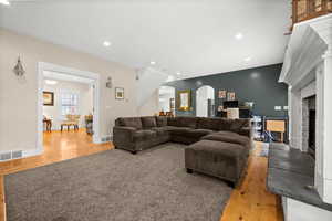 Living room with hardwood / wood-style floors