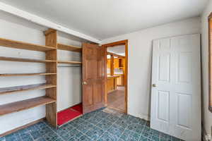 Unfurnished bedroom featuring a closet