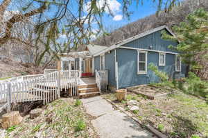 View of front of property featuring a deck