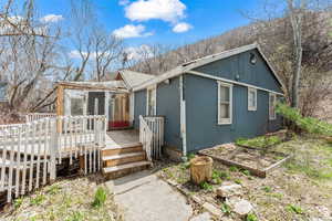 View of front of home featuring a deck