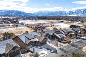 Snowy aerial view with a mountain view