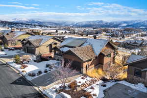 Snowy aerial view with a mountain view