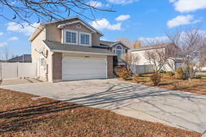 View of front property featuring a garage