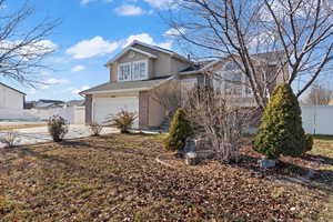 Front of property with a garage