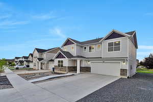 View of front of home featuring a garage