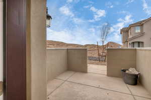 View of patio / terrace with a mountain view