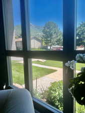 Doorway to outside featuring a mountain view