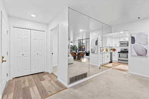 Interior space featuring sink and light hardwood / wood-style flooring