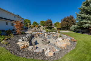 View of yard with a fire pit