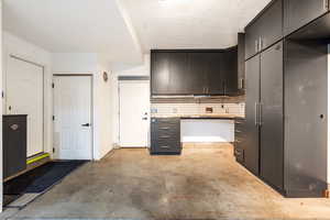 Kitchen featuring a textured ceiling