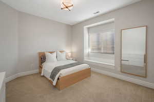 View of carpeted bedroom