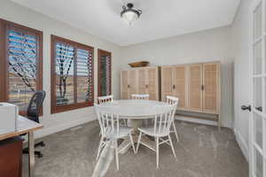 View of carpeted dining area