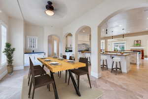 Archways separate dining room from kitchen