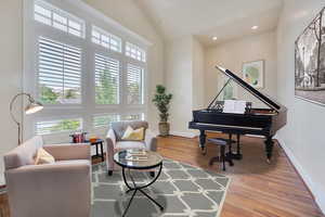 Large room just off the entryway could be an office, sitting area, or music room