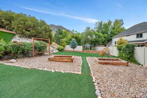 View of yard with a mountain view