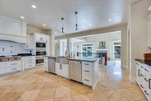 Kitchen opens on to both the living room and dining area