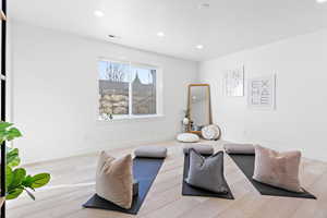 Living room with light hardwood / wood-style flooring