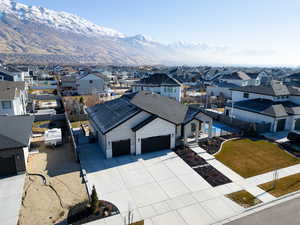 Birds eye view of property with a mountain view