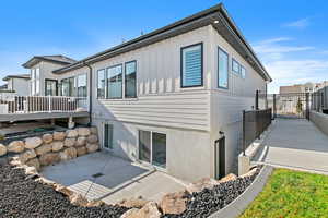 Rear view of house with a patio area