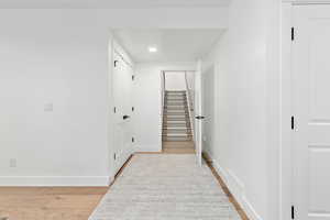 Hallway featuring light hardwood / wood-style floors