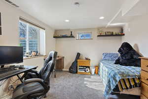 View of carpeted bedroom