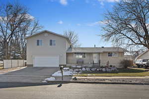 View of front of house with a garage