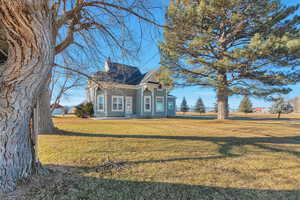 View of front of property featuring a front yard