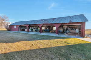 View of property's community with a yard