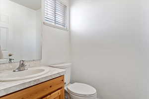 Bathroom with toilet and vanity