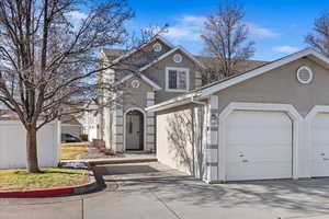 Front of property featuring a garage